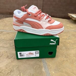 NWB Puma Kids in Coral and White. Size 6.5y which fits women’s size 8.